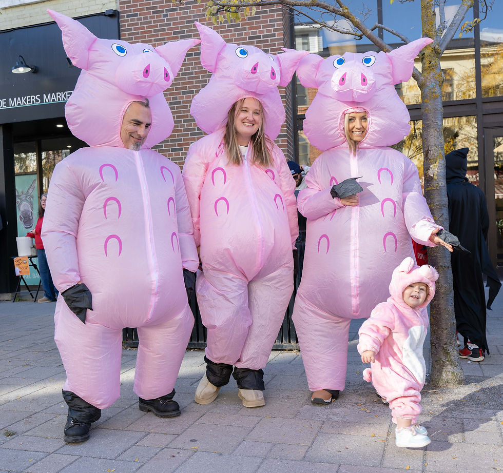 (Left-to-right) Cobourg King Steet CIBC employees Christian Jefferson, Jessica Jones, and Amanda Hughes, with one-year-old Audrey Wardle in front.