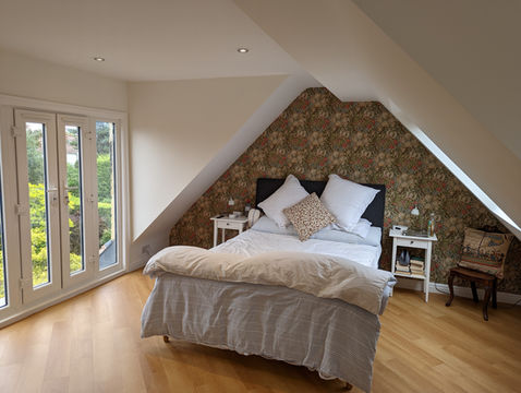 Wallpapered loft feature wall