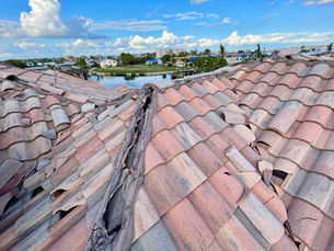 Polaris Roofing inspecting residential roof installation and permitting compliance in Southwest Florida.
