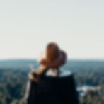 Woman overlooking hillside. Solid Ground Counseling for teens and adults in Cedar Park, TX