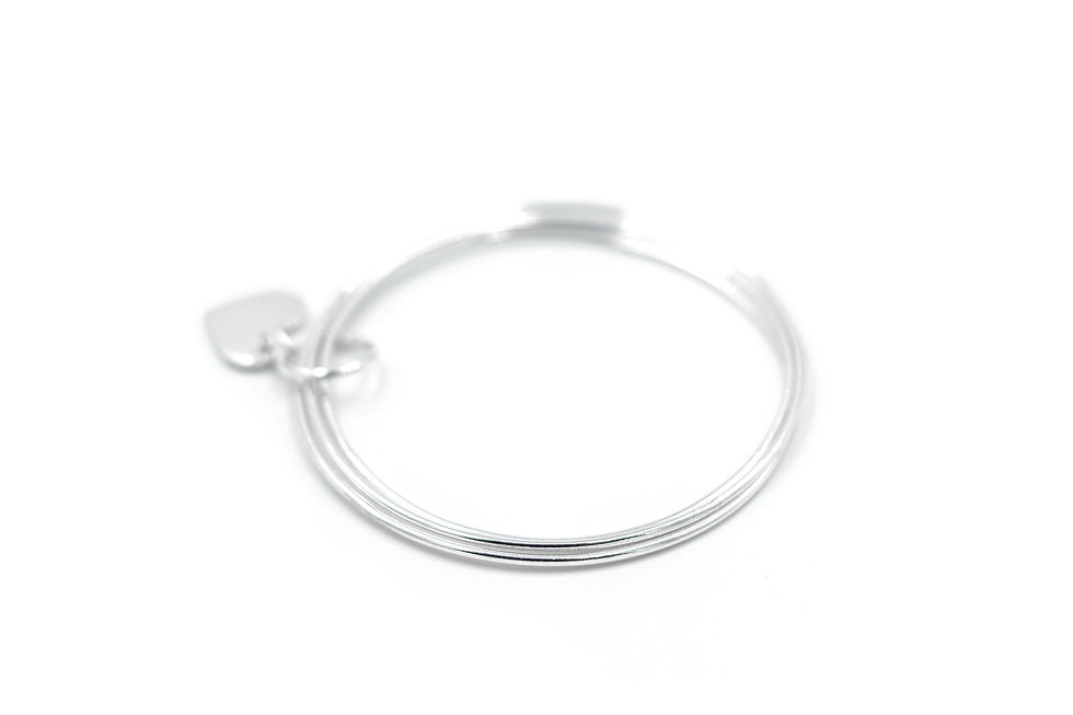 Thumbnail: Sterling silver bangles locked with heart charm