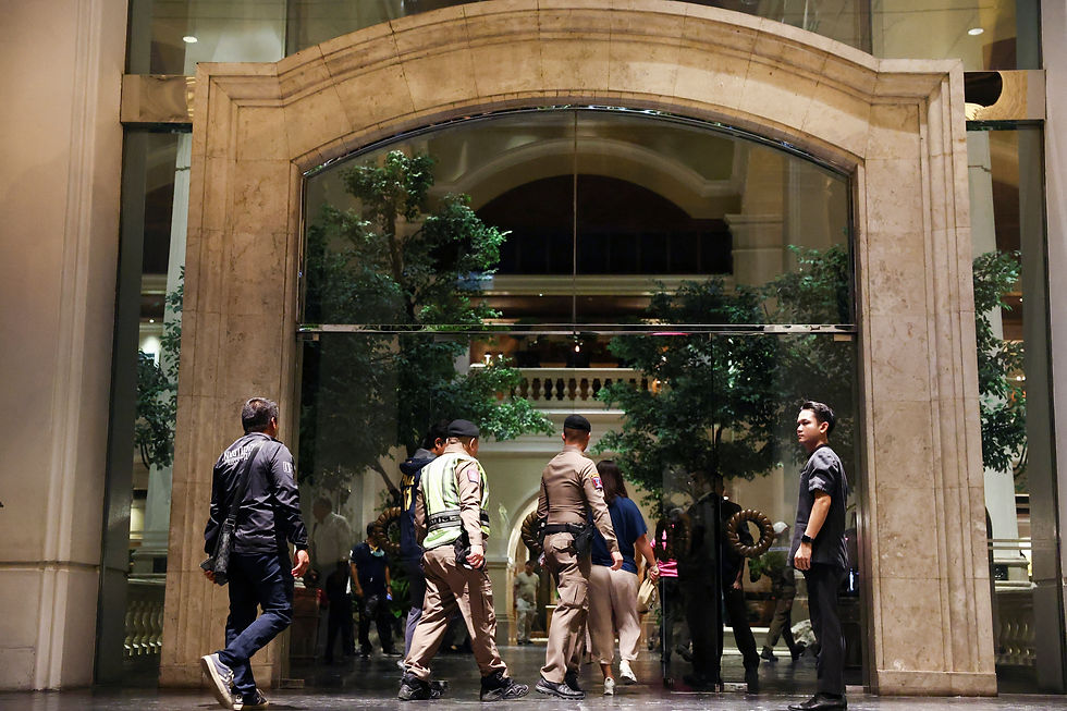 Policemen walk inside Grand Hyatt Erawan hotel, which believed that at least 6 people have been reported dead, in Bangkok, Thailand, July 16, 2024. /Chalinee Thirasupa