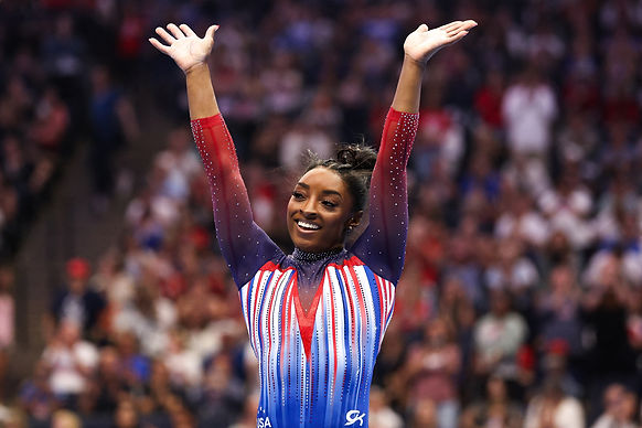 Minneapolis, Minnesota, USA; Simone Biles celebrates her floor routine during the U.S. Olympic Team Gymnastics Trials at Target Center. Mandatory Credit: Matt Krohn-USA TODAY Sports