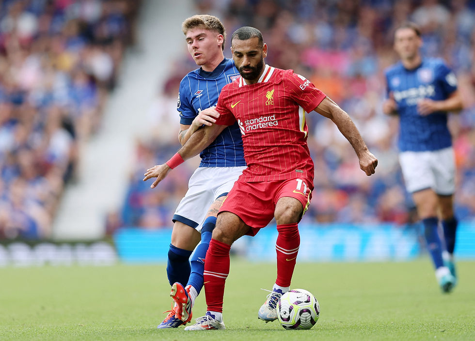 Premier League - Ipswich Town v Liverpool - Portman Road, Ipswich, Britain - August 17, 2024 Liverpool's Mohamed Salah in action with Ipswich Town's Leif Davis /David Klein
