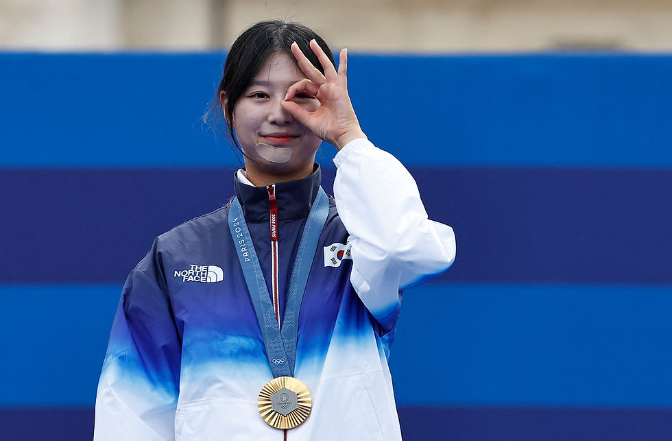 Paris 2024 Olympics - Archery - Women's Individual Victory Ceremony - Invalides, Paris, France - August 03, 2024. Gold medallist Sihyeon Lim of South Korea reacts. /Tingshu Wang