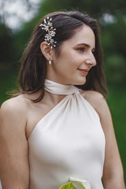 Kate, the bride, with sparkling hairpiece at Mythe Barn wedding.