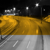 roadway with streetlights at night