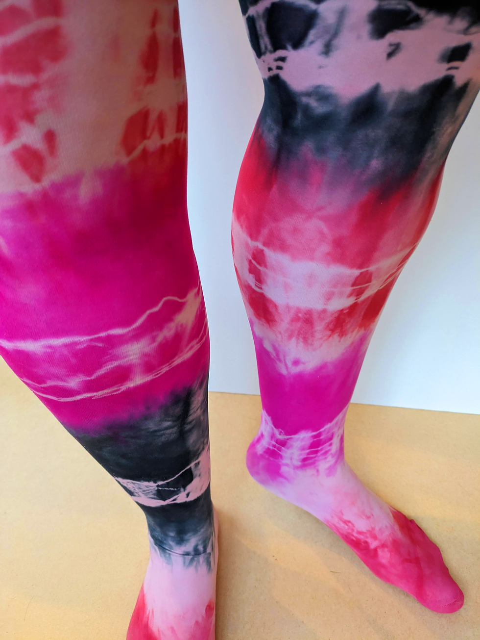 Thumbnail: Pink, red and black tie dye tights by Loulabelle Couture. They have an alternative gothic style and are goth, punk, witch,