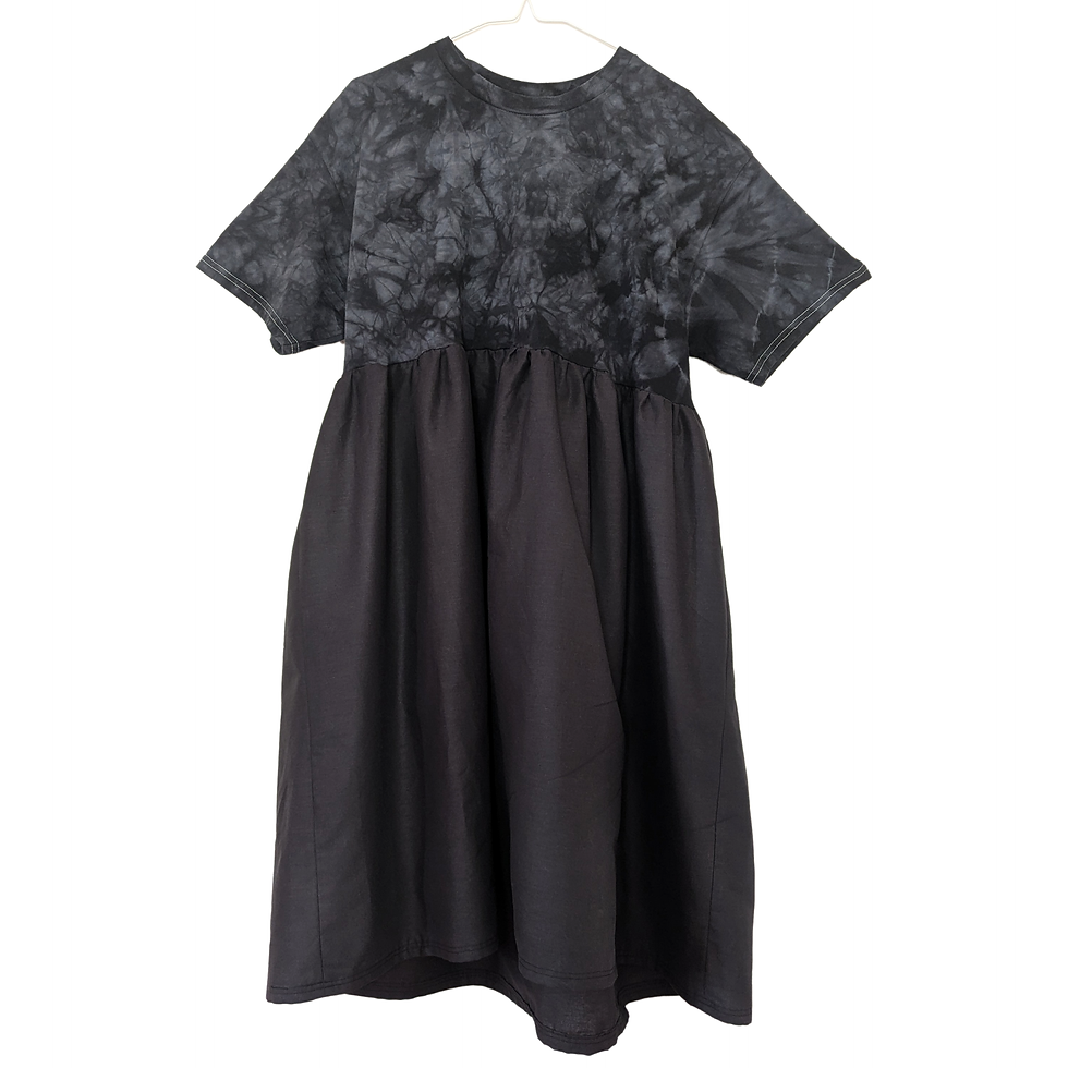 A loose smock short sleeved t-shirt dress. It has a gothic, grunge, punk tie dye top and skirt in charcoal grey and black