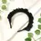 Thumbnail: A black ruffle, frilly hairband.  Handmade cotton witchy headband in a whimsical goth style