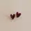 Thumbnail: A romantic pair of I heart you stud earrings in dark pink red merlot by Pepper You.  They are made from a beautiful acrylic
