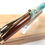 Thumbnail: Hawaiian Koa Surfboard Resin Designer Slimline Ballpoint  (Teal White)