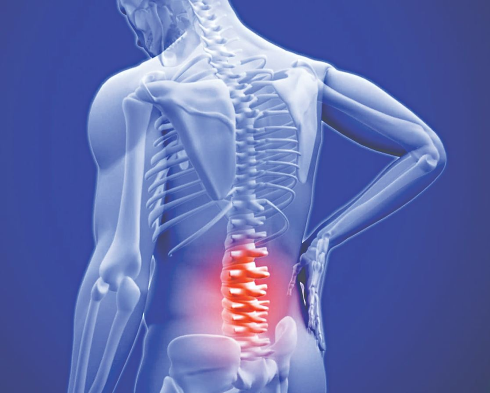 X-ray of a human spine in blue tones, highlighting lower back pain in red. Person holds back, conveying discomfort.