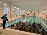 Swim Team posing after a swim session