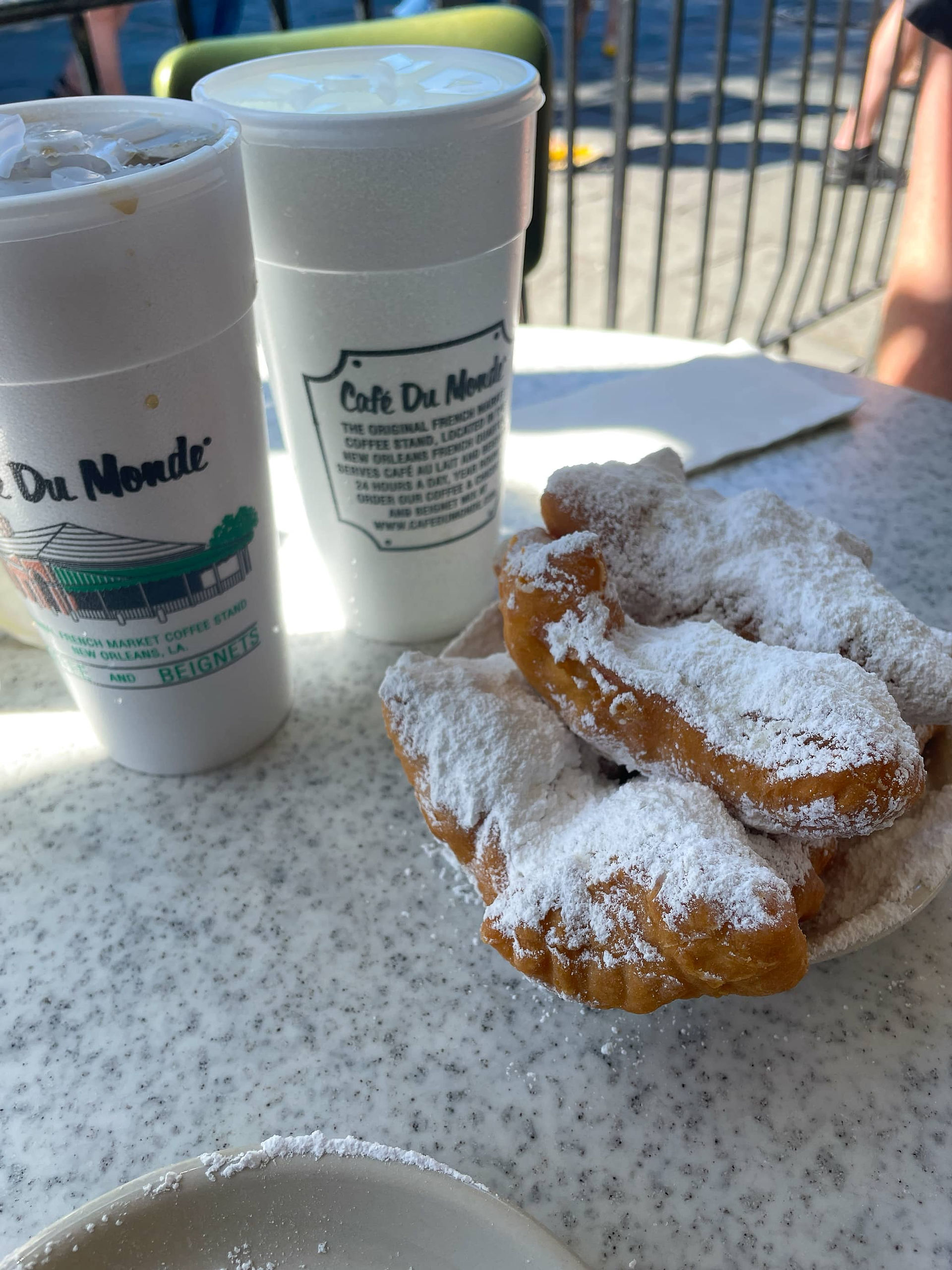 Cafe Du Monde cups and beignets 