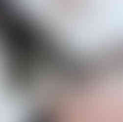 Portland Lobster Co sign with man sitting in front of building