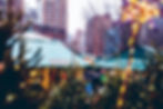 Christmas trees framing the market with sparkly lights