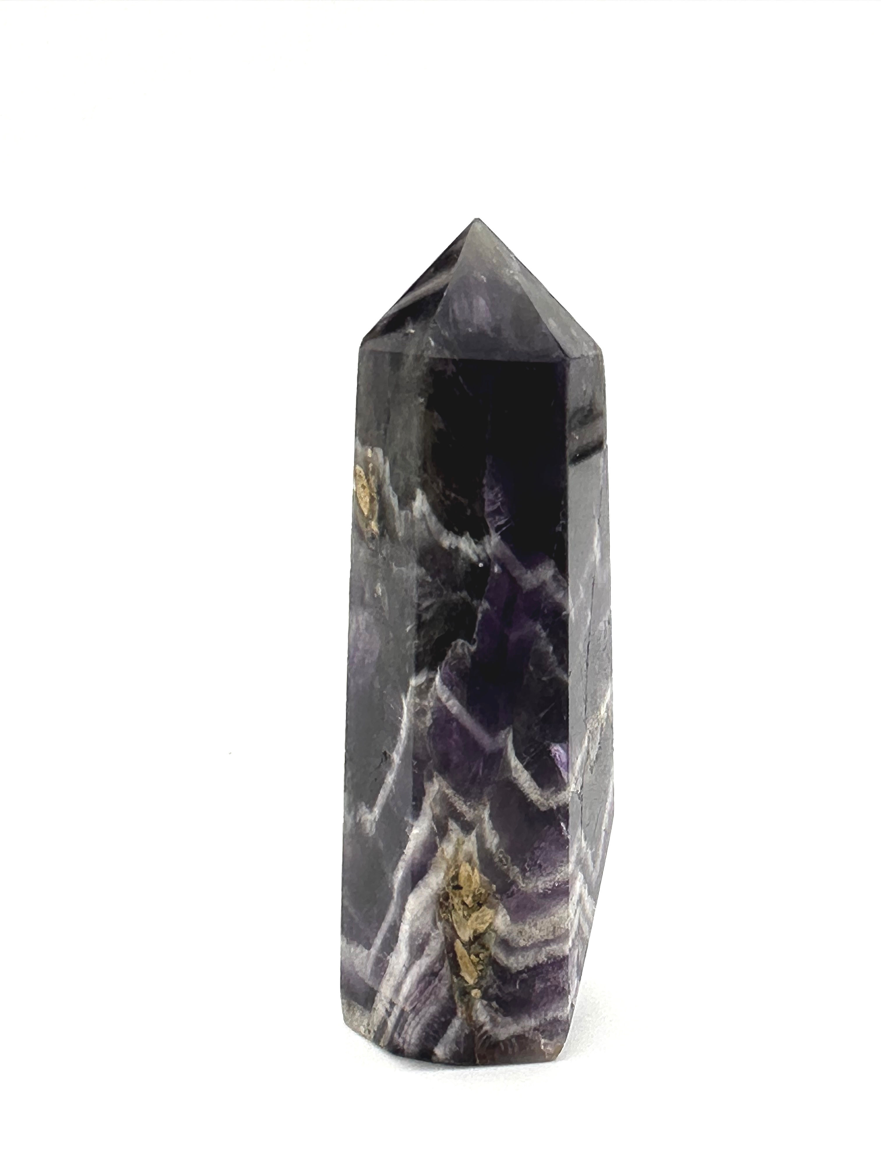 Elegant obelisk made from Chevron Amethyst, perfect for spiritual growth and clarity.