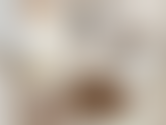 Neutral interior collage showing a softly styled bedroom with a pleated pendant light, marble wall detail, linen bedding, warm wood chair and side table, woven rug, glass vase, sculptural candle holder, and layered neutral decor in a calm, modern organic palette.