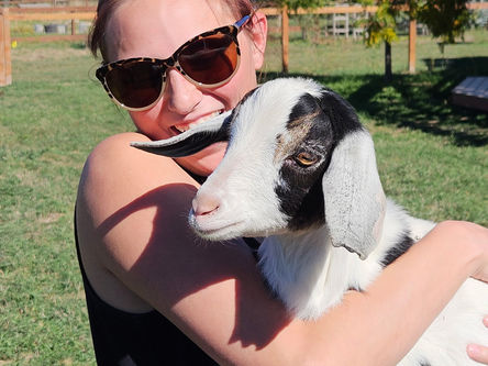 Anna and our new baby goat, Jack