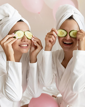 Happy young women wear white bathrobes t