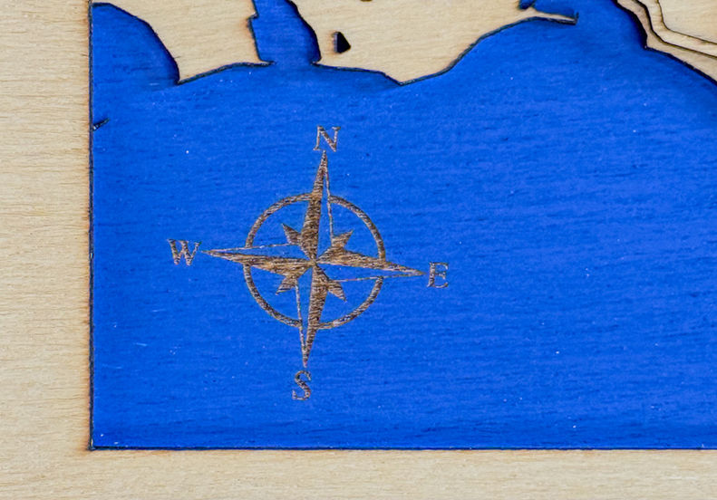 Custom detailed engraving from an up-close, precision laser engraved on wood with realistic detail.
