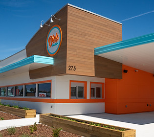 Dick Mondell's Burgers and Fries fast-food restaturant with outdoor dining area