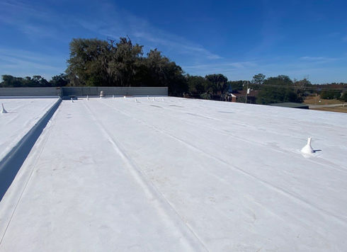 Large new white flat roof