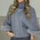 Thumbnail: Polar Neck Grey Knitted Poncho Jumper with Faux Fur Cuffs 