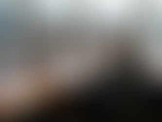 Compliance officer reviewing dashboard in corner office