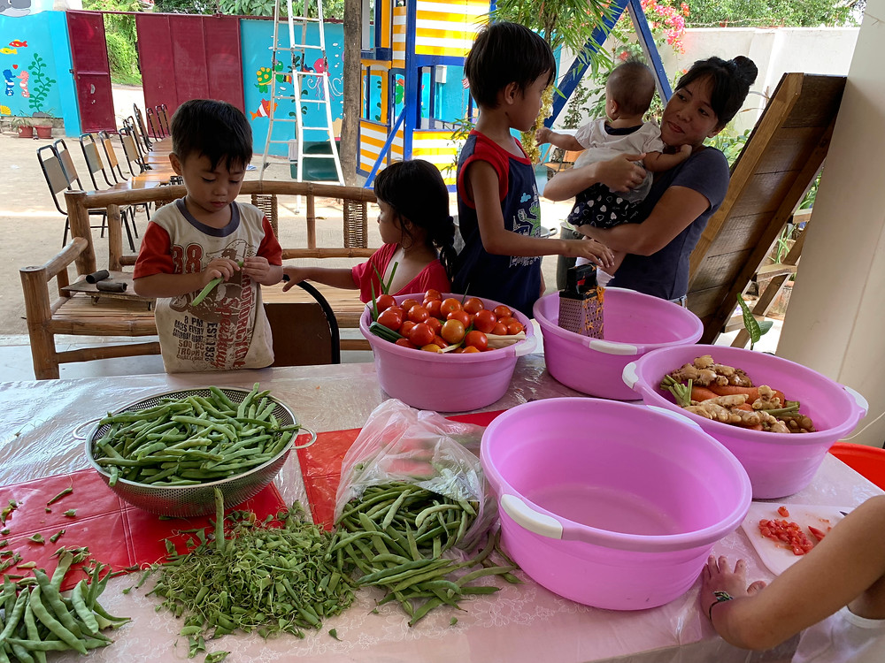 Preparing dinner at the Rise Above Foundation