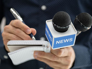 A journalist taking notes 