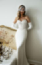 Cassandra mermaid wedding dress with corset bodice and sweetheart neckline in elegant bridal setting.