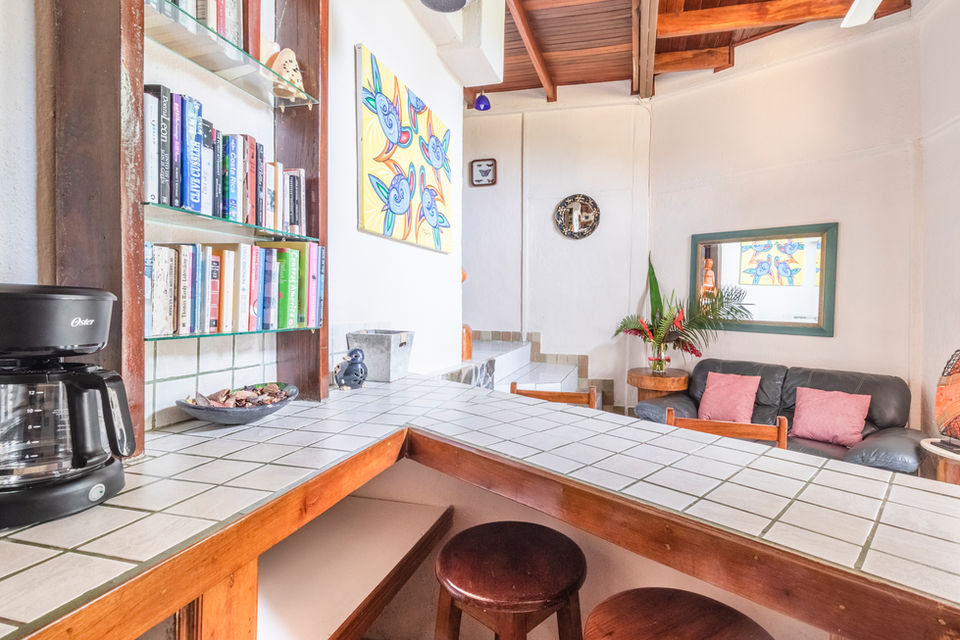 Bougainvillea Suite cozy living room with tropical decor at Boutique Hotel Las Cascadas Costa Rica