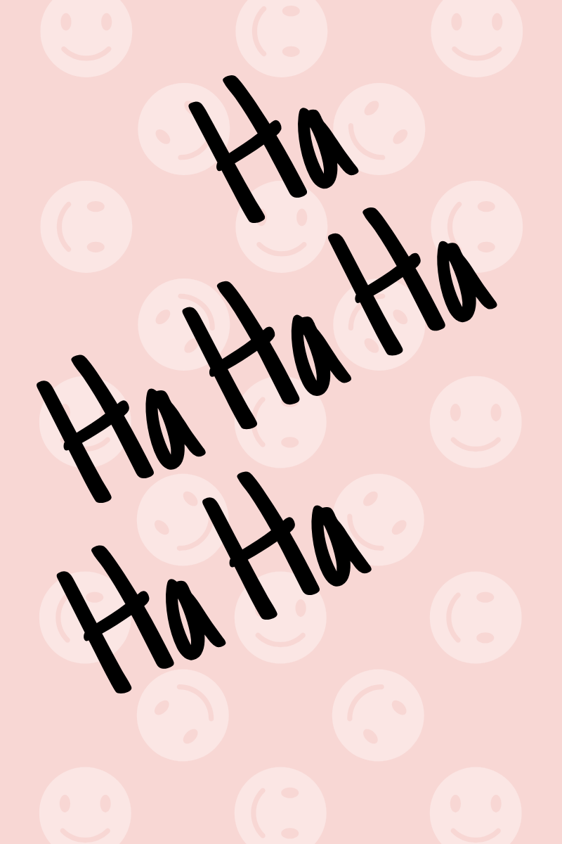 Close-up view of a collection of colorful laughter-themed decorative objects