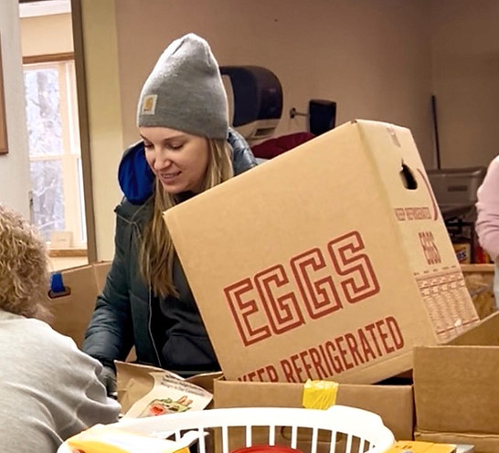 Carbon County Young Republicans volunteer organizing and distributing food donations at a local community service event.