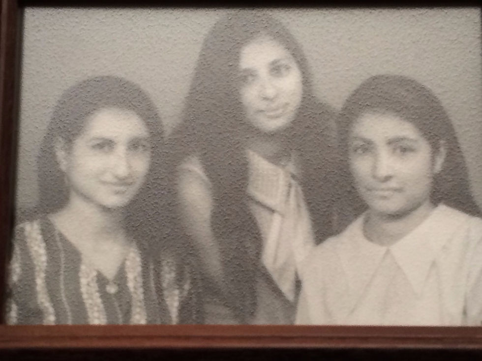 As a teen (center) with aunts