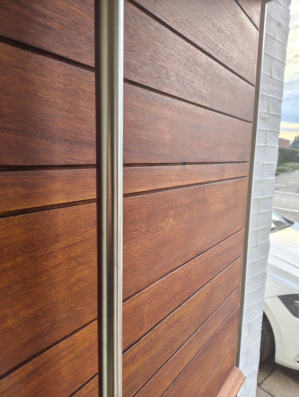 Detail van afzelia voordeur behandeld in Rubio Monocoat