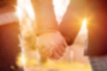 Two recovering alcoholics holding hands