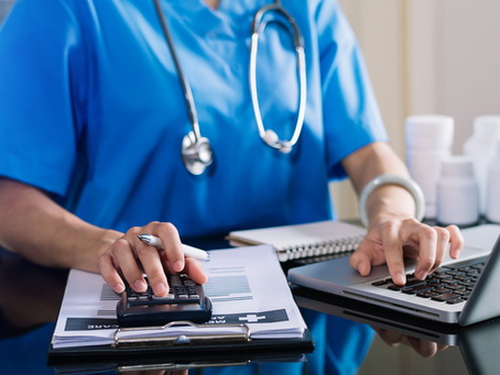 Medical professional doing paperwork