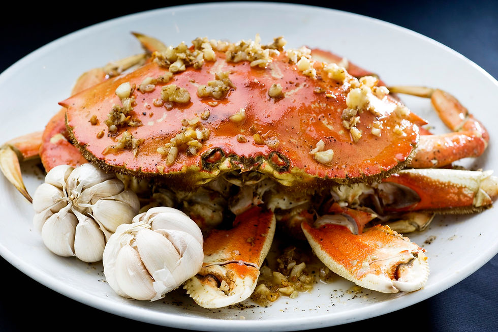 Garlic roasted Dungeness crab at Crustacean Beverly Hills, Food Journal Magazine