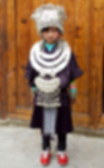 Miao girl in family's finery