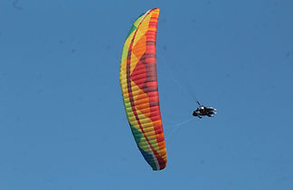 Acrobatic paragliding in bir with 2nd ranking pilot of India. Know about stunts, price, duration, and safety. Read more....
