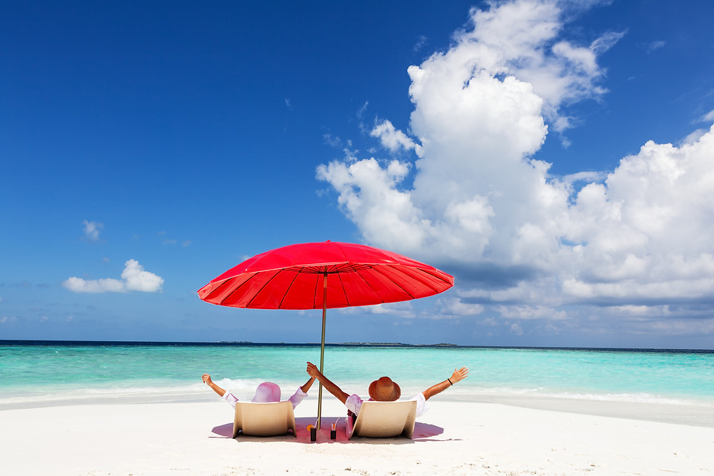 Two people enjoying the beach on their period
