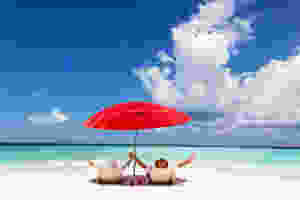 Two people enjoying the beach on their period