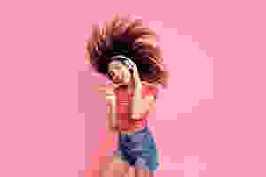 Pretty girl listening to music when she is on her period