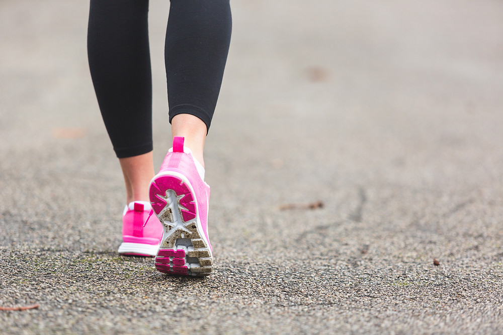 Girl jogging to boost her mood while on period