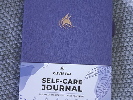 A purple Self-Care Journal by Clever Fox 
