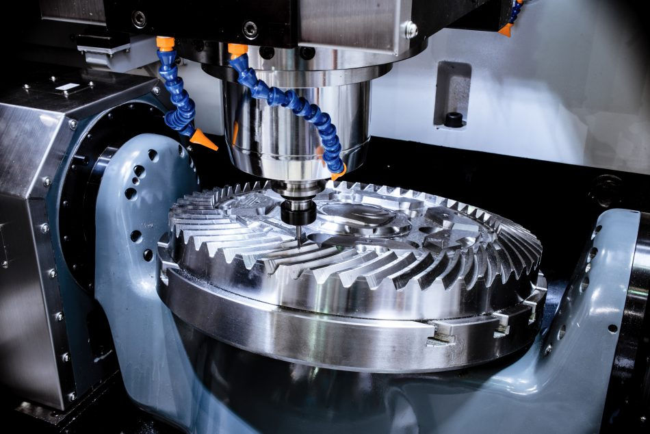 CNC machine spindle cutting metal part
