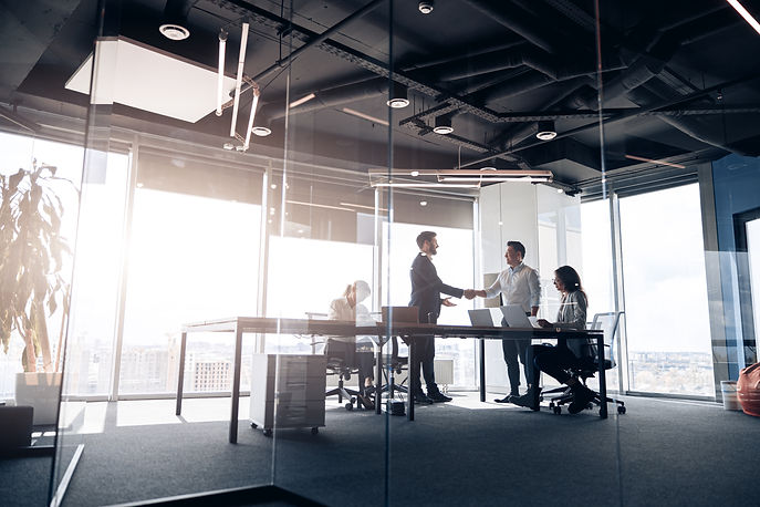 people-standing-near-table-team-young-businessmen-working-communicating-together-office.jp
